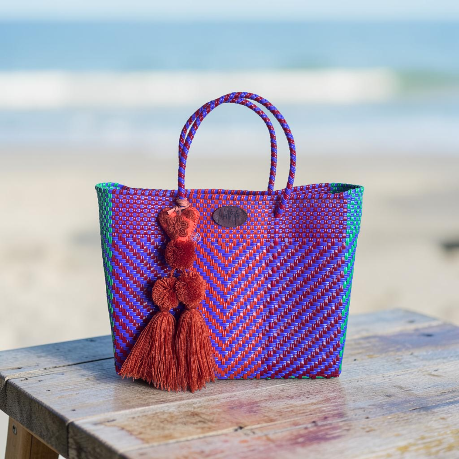Cartera tejida pequeña morado/vino/naranja
