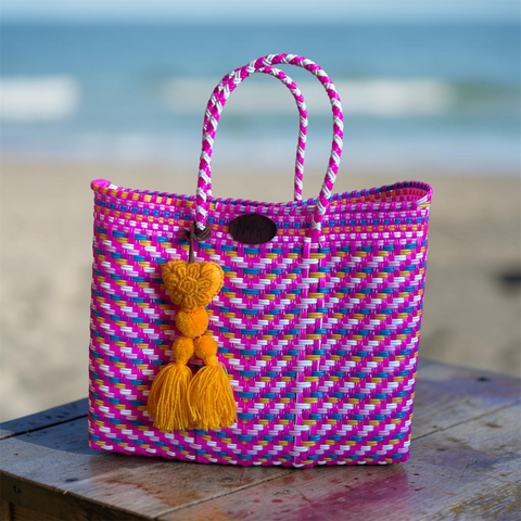 Cartera tejida pequeña fucsia
