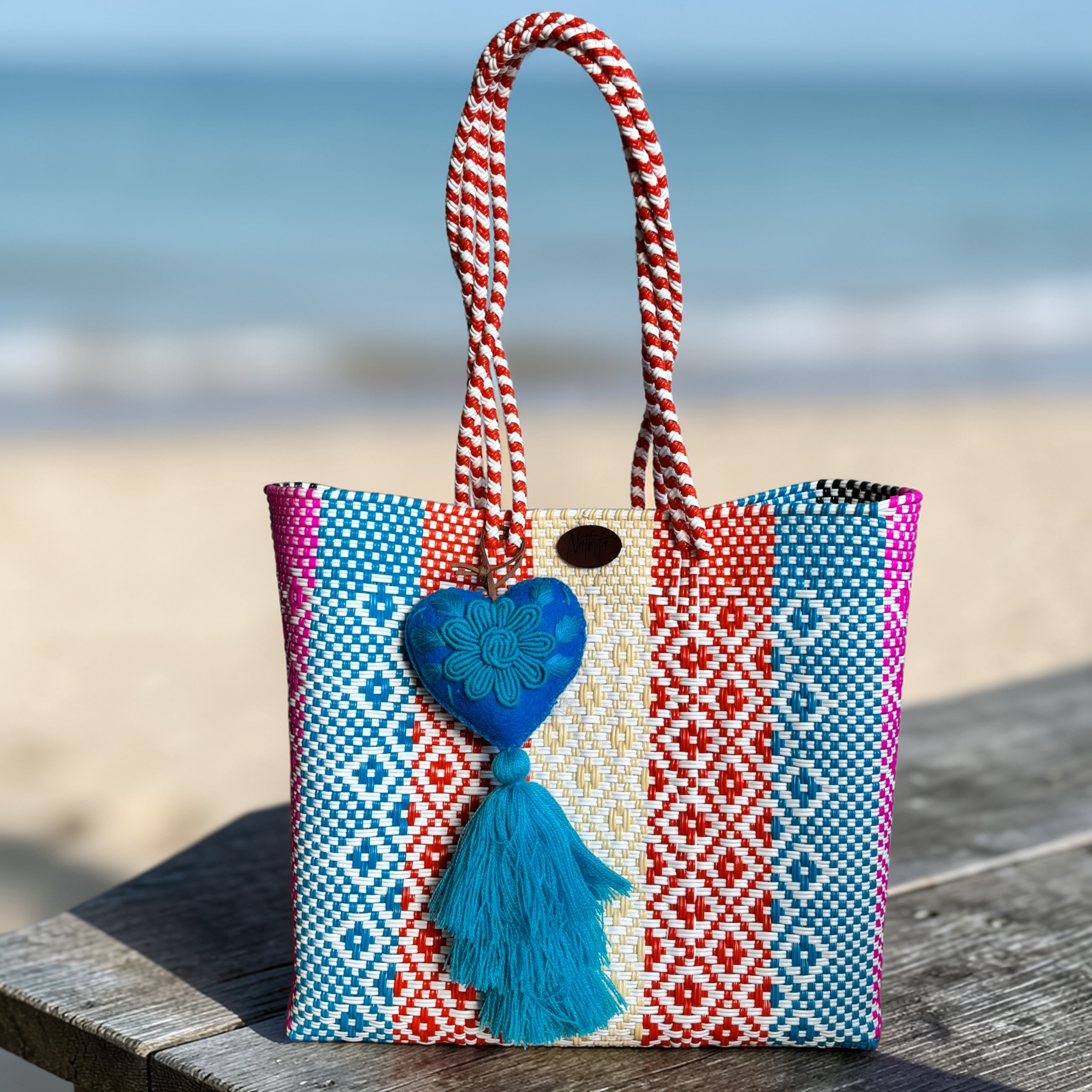 Cartera tejida mediana rayas azul/amarillo/mamey